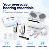 GoSound hearing aid pair, charging case, silicone domes, charging accessories, brush and user guide