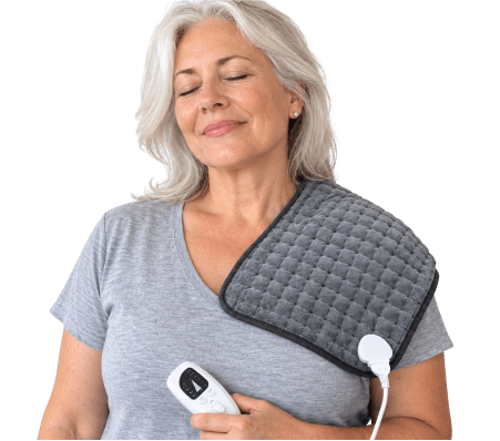 Woman relaxing with a ThermaPad Flex heating pad