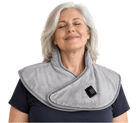 Woman wearing a gray ThermaWrap Go heating wrap