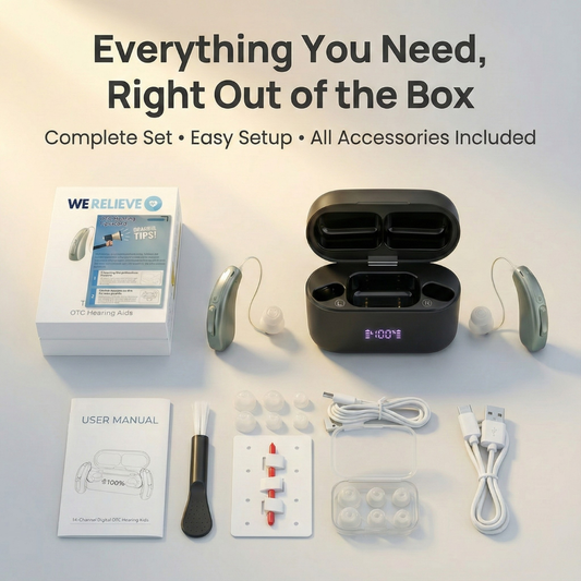 Overhead view of the complete WeRelieve OTC hearing aid kit unboxed. The set features two silver rechargeable hearing aids, a black digital charging case, the branded retail box, user manual, cleaning tools, extra wax guards, multiple sizes of silicone eartips, and USB charging cables.